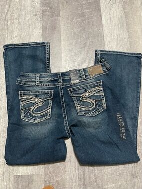 Silver Jeans Dark Blue Boot Cut Jeans with Embroidered Back Pockets